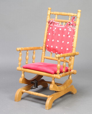 A child's turned beech American style rocking chair 