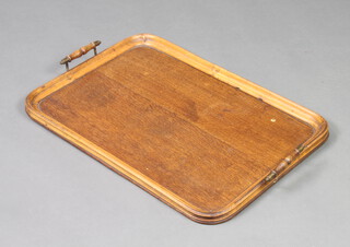 An oak twin handled tea tray 58cm x 40cm 