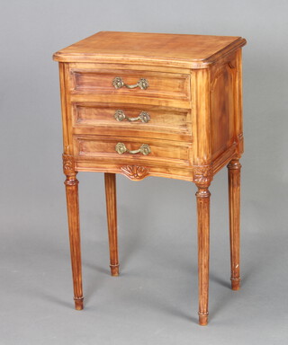 A French style concave walnut chest of 3 drawers raised on turned and fluted supports 68cm x 41cm x 30cm 