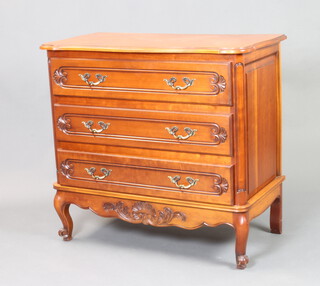 A French style walnut chest of serpentine outline fitted 3 long drawers, raised on cabriole supports 89cm h x 97cm w x 50cm d 