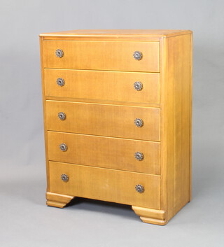 An oak chest of 5 drawers raised on bracket feet 112cm h x 84cm w x 46cm d 
