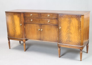 A Georgian style mahogany sideboard fitted 3 drawers above cupboards, flanked by cupboards, raised on turned supports 86cm h x 175cm w x 48cm d 