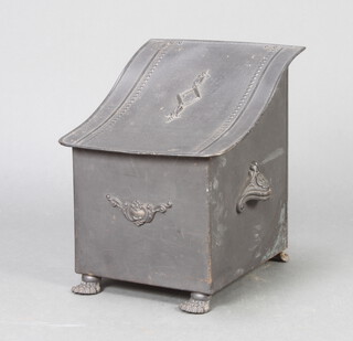 A 1920's shaped pressed metal twin handled coal bin with hinged lid on paw feet 37cm h x 30cm w x 35cm d 