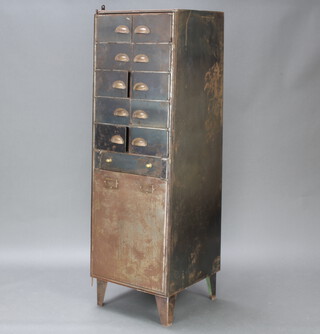 A mid Century industrial 10 section metal locker, the base fitted a cupboard enclosed by a flap 168cm h x 54cm w x 48cm d (some light rusting in places) 