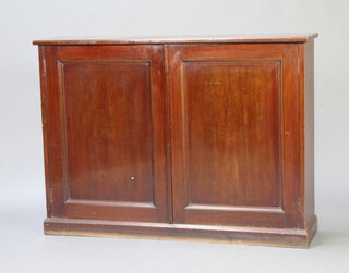 A 19th Century mahogany cabinet with shelved interior enclosed by panelled doors, on a platform base 92cm w x 126cm w x 29cm d 