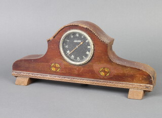 Jaeger, a 1930's 8 day car clock with 7cm black painted dial contained in an Admiral's hat shaped mahogany case 