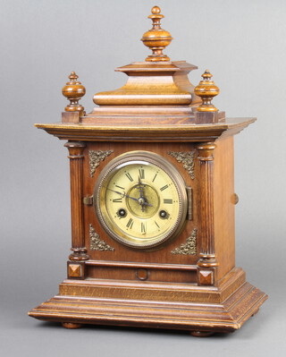 J Unghans, a Victorian 8 day striking bracket clock with paper dial and Roman numerals, contained in a walnut case complete with pendulum and key 