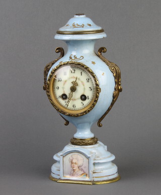 Mougin, a French 19th Century 8 day striking mantel clock, the back plated marked Mougin 108, with floral porcelain dial and Arabic numerals contained in a blue porcelain and gilt mounted case in the form of an urn, complete with key, 25cm h 
