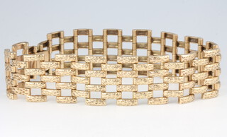 A 9ct yellow gold bark finish bracelet, 32 grams 