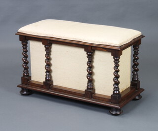 A Victorian rectangular rosewood ottoman with hinged lid raised on spiral turned supports, bun feet 43cm h x 76cm w x 35cm d 