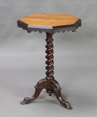 A Victorian octagonal walnut finished and ebonised snap top wine table raised on a spiral turned column and tripod base 72cm h x 52cm x 52cm  