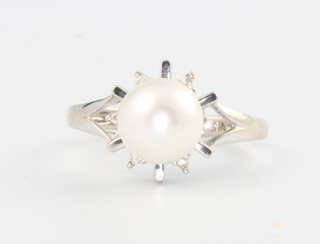 A 10ct white gold cultured pearl and diamond ring, 2.1 grams, size J 