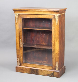 A Victorian inlaid walnut pier cabinet, fitted shelves enclosed by glazed panelled door 100cm h x 76cm w x 31cm d 