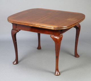 A 1930's Queen Anne style mahogany draw leaf dining table with patented draw leaf action, raised on cabriole supports 74cm h x 91cm w x 108cm l x 167cm l when extended 