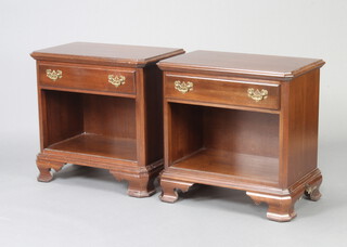 Ethan Allen, a pair of Georgian style side cabinets fitted a drawer above recess, raised on ogee bracket feet 67cm h x 68cm w x 41cm d 