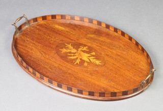 An Edwardian oval inlaid mahogany twin handled tea tray 3cm x 60cm w x 37cm d 