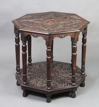 A Victorian carved oak octagonal occasional table raised on turned supports 73cm h x 75cm w x 75cm d 