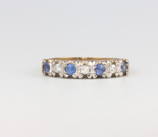 A 9ct yellow gold sapphire and diamond ring 2.7 grams, size Q 1/2