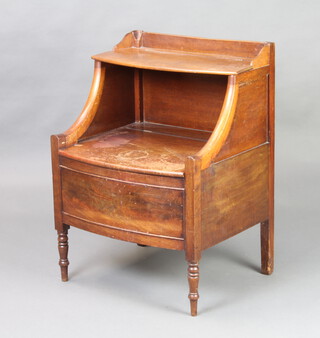 A Georgian mahogany bow front commode with hinged lid raised on turned supports 76cm h x 55cm w x 46cm d 