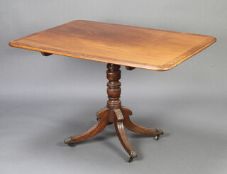 A Georgian rectangular, crossbanded mahogany snap top breakfast table, raised on a turned column and tripod base 75cm h x 117cm w x 88cm d 