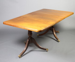 A Georgian style mahogany D end extending dining table raised on pillar and tripod supports with 1 extra leaf 74cm h x 103cm w x 178cm l