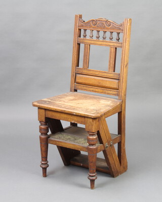 A late Victorian metamorphic carved oak 4 tread library steps in the form of a bar back chair with bobbin turned decoration, when closed 88cm h x 44cm w x 35cm d, when open 89cm h x 58cm w x 35cm d   