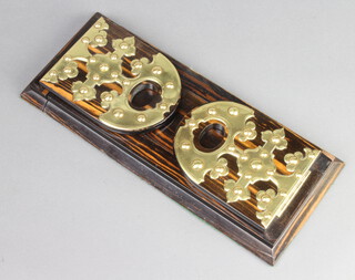A Victorian coromandel expanding bookend with gilt metal mounts 16cm x 35cm x 15cm 