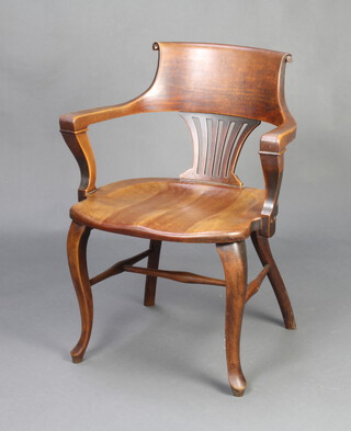 An Edwardian mahogany slat and tub back office chair with solid seat, on cabriole supports with H framed stretcher  