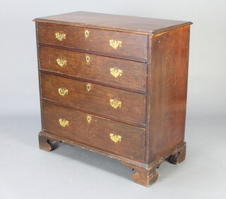 An 18th Century oak chest of 4 long drawers with replacement brass swan neck drop handles, raised on bracket feet 95cm h x 95cm w x 48cm d 
