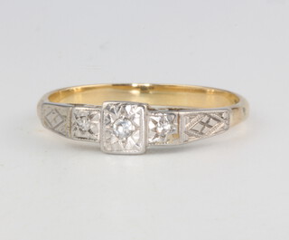 An 18ct yellow gold diamond ring size P, 2.6 grams 