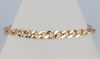A 9ct yellow gold curb link bracelet 21cm, 21.5 grams