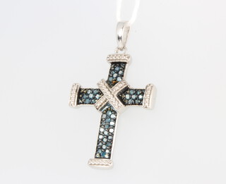 A silver, blue and white diamond cross pendant, 2.9 grams, 35mm 
