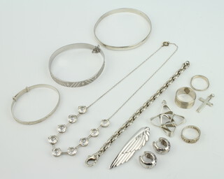 A silver bangle and minor silver jewellery, 100 grams