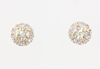 A pair of 18ct yellow gold diamond ear studs approx. 0.75ct, 2.1 grams, 7mm 