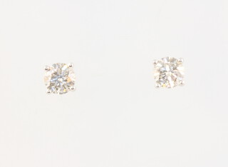 A pair of 18ct white gold brilliant cut diamond ear studs, 2.1 grams, 1ct, 5mm