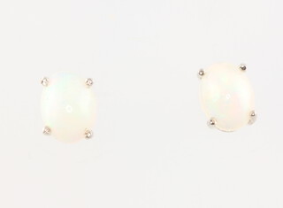 A pair of silver opal ear studs 