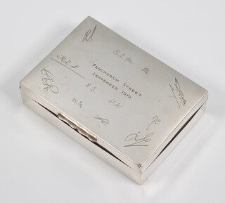 A silver cigarette box with presentation inscription, London 1919, 12cm 