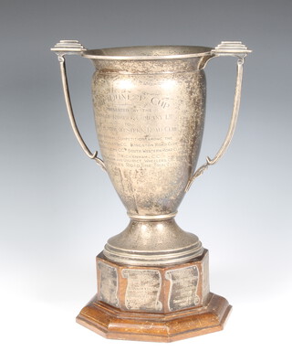 A silver 2 handled presentation trophy with engraved inscription Birmingham 1937, 28cm, 1288 grams, with a mounted wood stand
