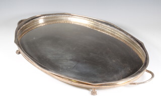 An oval silver plated galleried 2 handled tray 71cm 