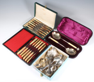 A pair of Edwardian silver plated serving spoons, cased, 2 cased sets and minor cutlery 