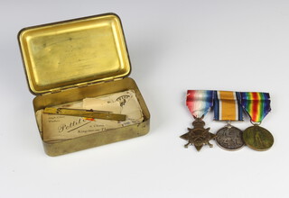 A World War One trio of medals to 370 Pte. S.J.Phillmore E.Surr.R together with a 1914 Christmas tin 