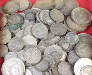 A quantity of pre-1947 coins, 690 grams