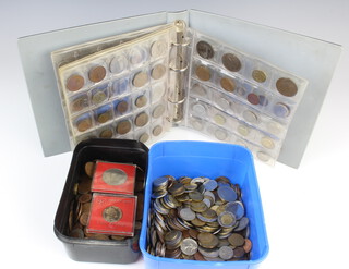 A quantity of world coins including a folder 