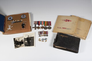 A D.F.C. group of medals to Flight Lieutenant J A Murrell, comprising Distinguished Flying Cross, privately inscribed J A Murrell 35 (PFF) Sqdn 1945, 1939-45 Star, France and Germany Star, Defence medal, War medal together with miniatures, dress miniatures, log book 1942-1948, a scrap book including maps, cartoons, drawings, a photograph album and a commercial pilots log book 1952-1954

