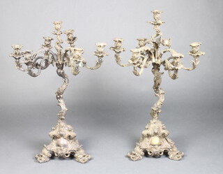 A pair of Victorian ex plated 7 light rococo candelabra 70cm