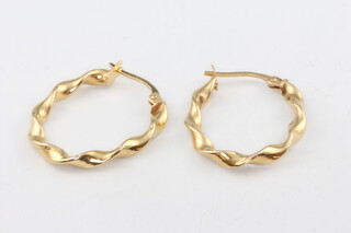 A pair of 9ct yellow gold twist earrings 1.2 grams 