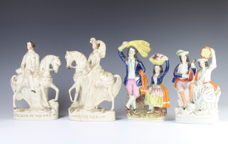 A pair of Victorian Staffordshire figures Prince of Wales and Princess 26cm, two Staffordshire groups of figures 24cm and 20cm 