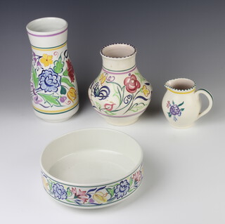 A 1970's Poole oviform vase decorated with stylised flowers 23cm, a baluster ditto 19cm, a jug 10cm and a fruit bowl 20cm  