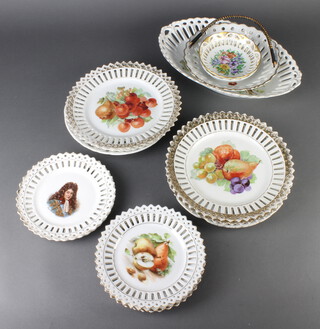 A pair of Edwardian tazza print ribbon plates decorated with fruits 23cm, 9 others, 2 dishes and a basket 