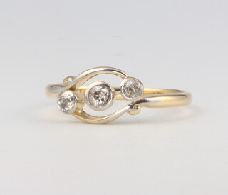 An 18ct yellow gold 3 stone diamond ring 2.8 grams, size P